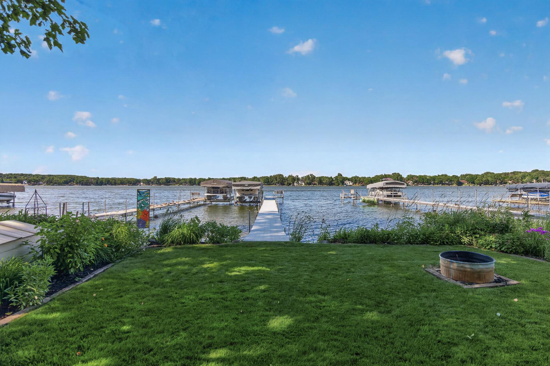 Gather around the lakeside firepit and enjoy sunset views, cozy bonfires, and endless memories at the water's edge.