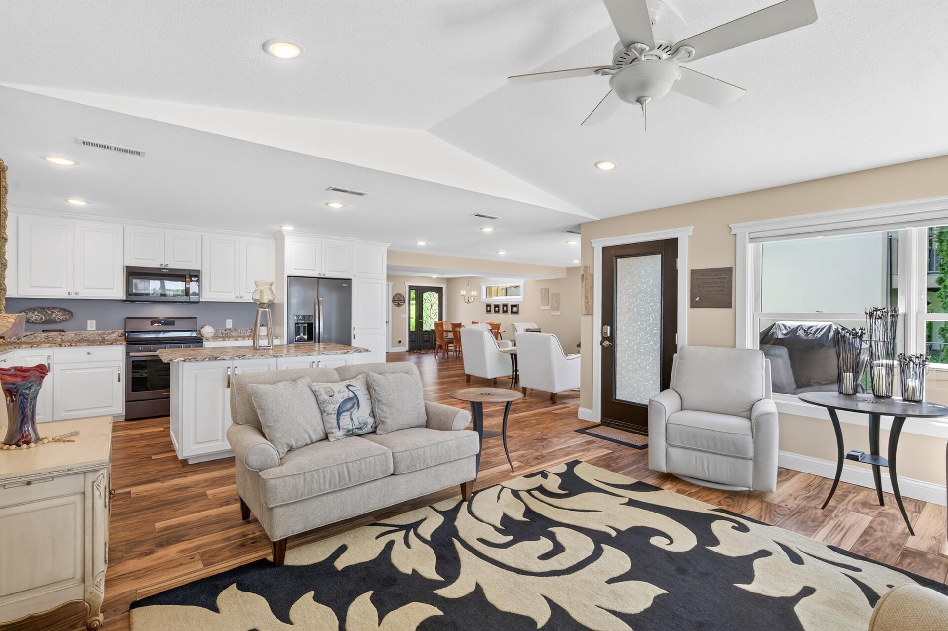 Bright, open living spaces create an inviting atmosphere for gathering and entertaining.