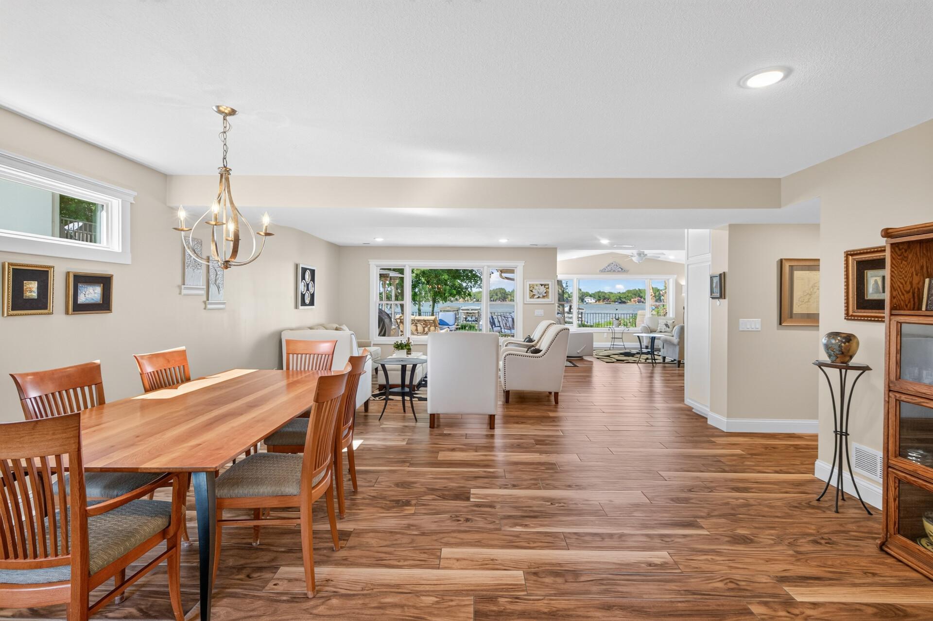 The dining and living areas flow seamlessly together, creating an inviting space for gathering and entertaining.
