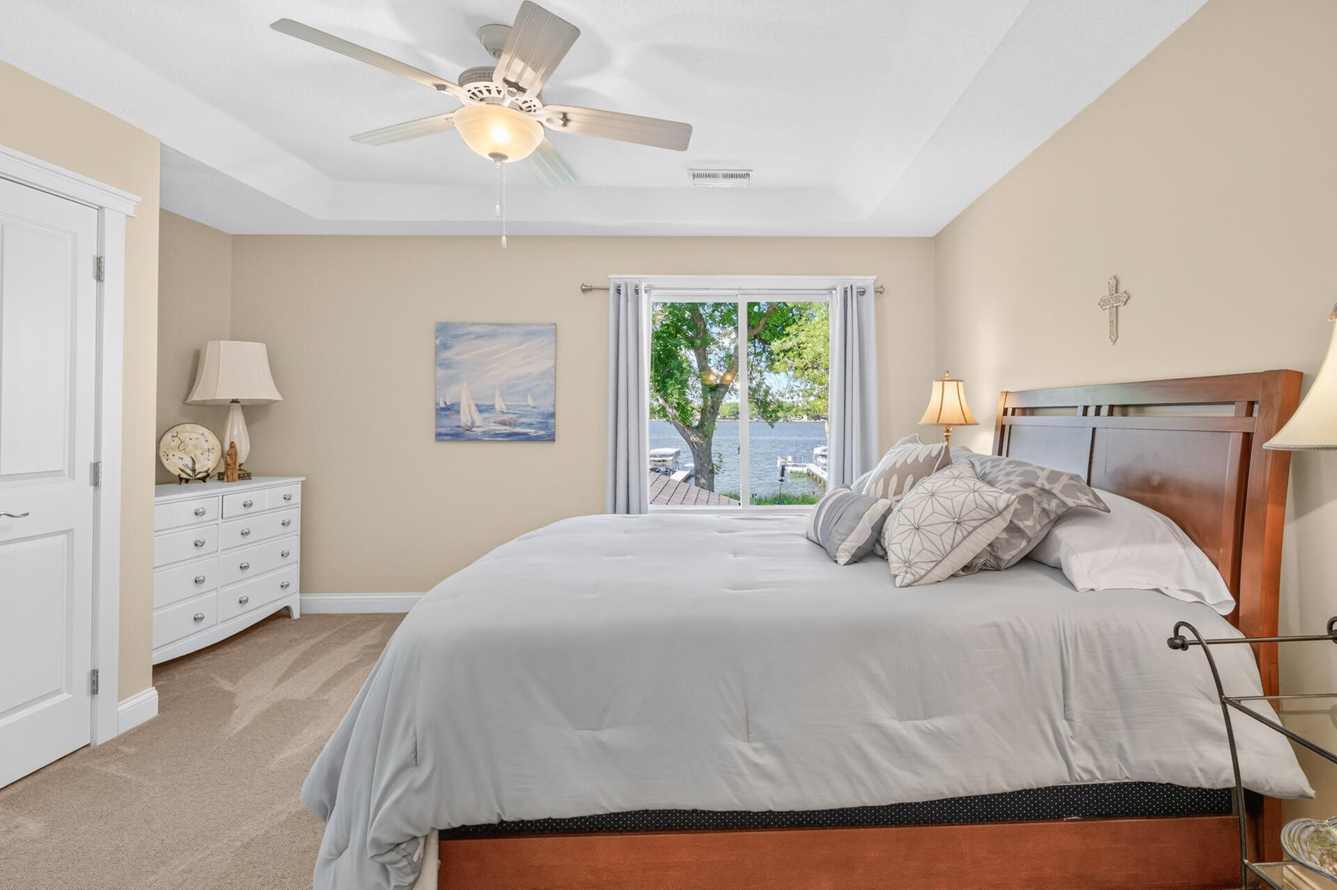 Here is an alternate view of the 2nd bedroom looking toward the lake. Imagine waking up to sparkling lake views.