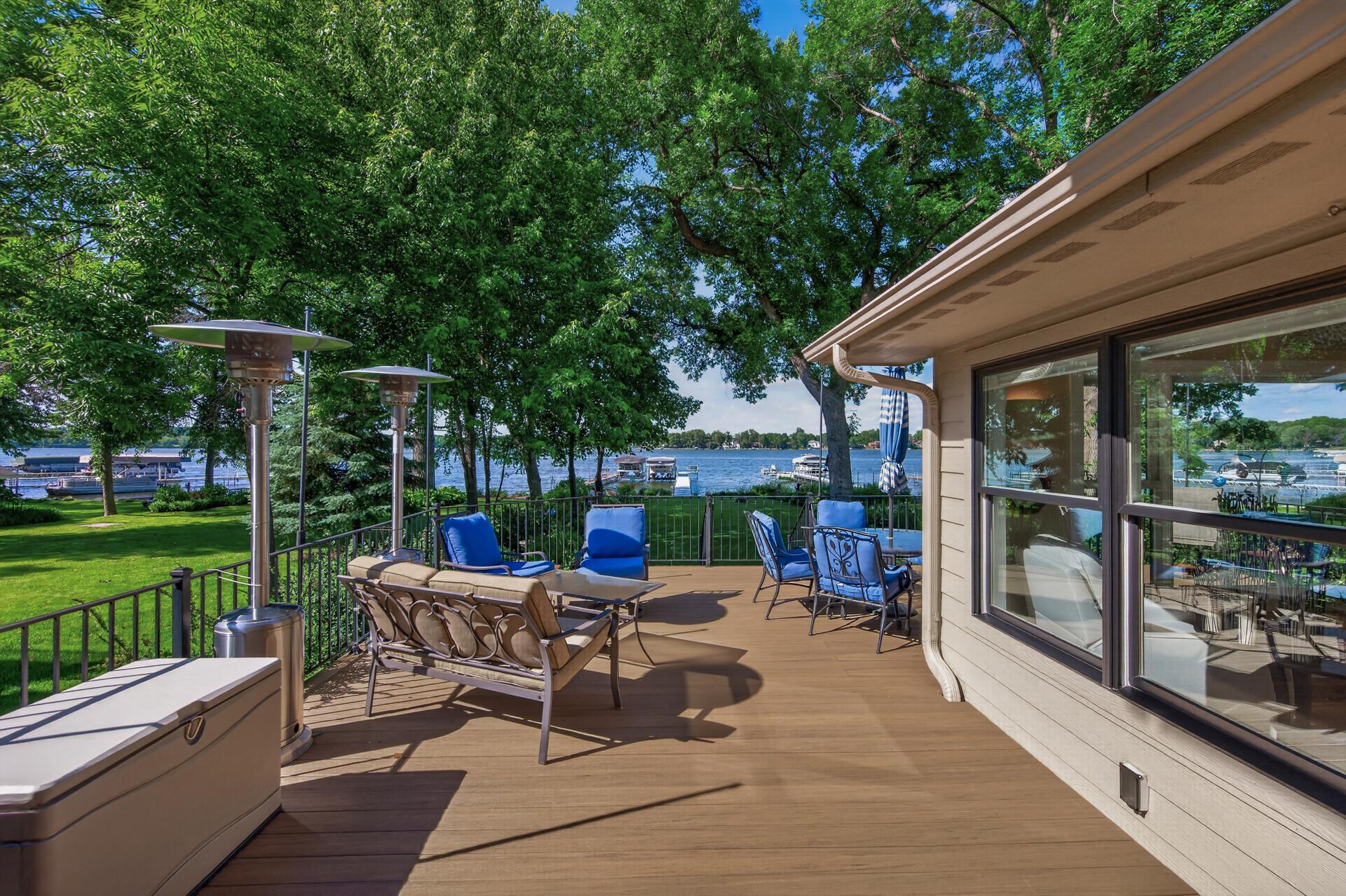 Breathtaking water views, towering mature trees, and effortless indoor-outdoor living define this extraordinary lakeshore sanctuary.