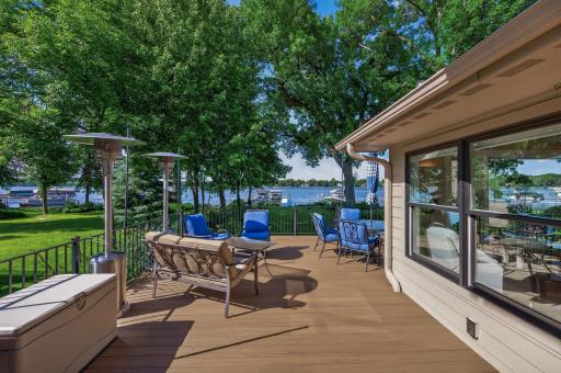 Breathtaking water views, towering mature trees, and effortless indoor-outdoor living define this extraordinary lakeshore sanctuary.