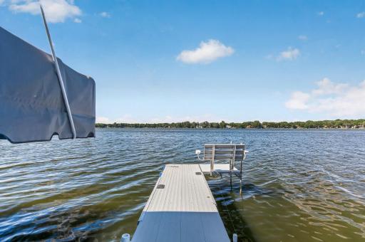 Wake up to sparkling water, gentle breezes, and endless shoreline views from your private dock. The dock, boat lift, and pontoon are available for purchase separately. See supplements for additional information.