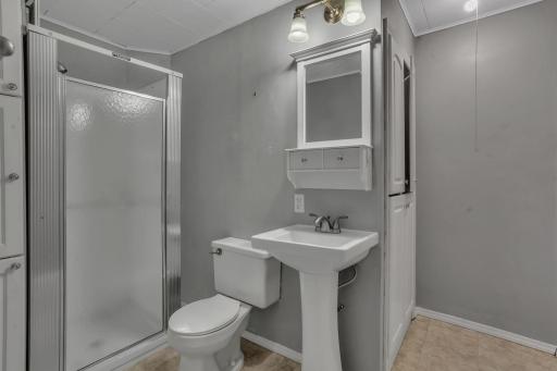 Main level 3/4 bath attached to primary bedroom!