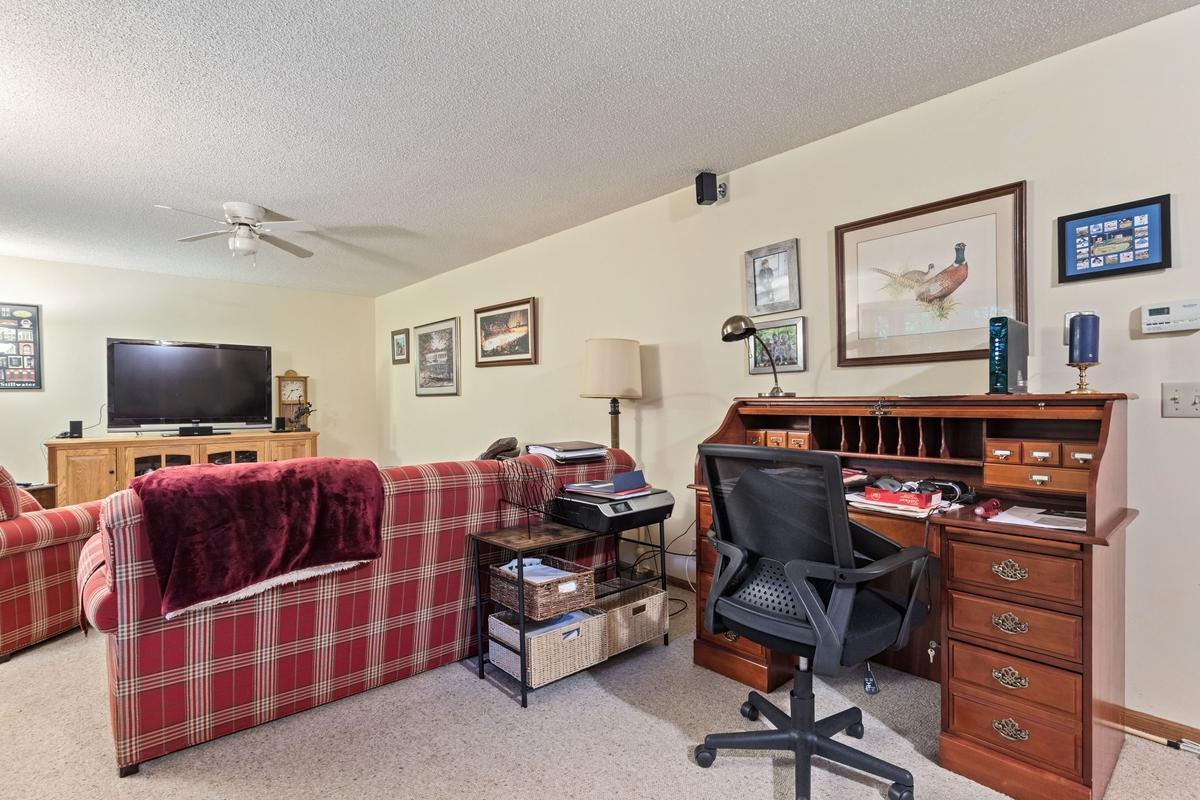 Walkout lower level family/rec room, there's also a 4th Bedroom not pictured