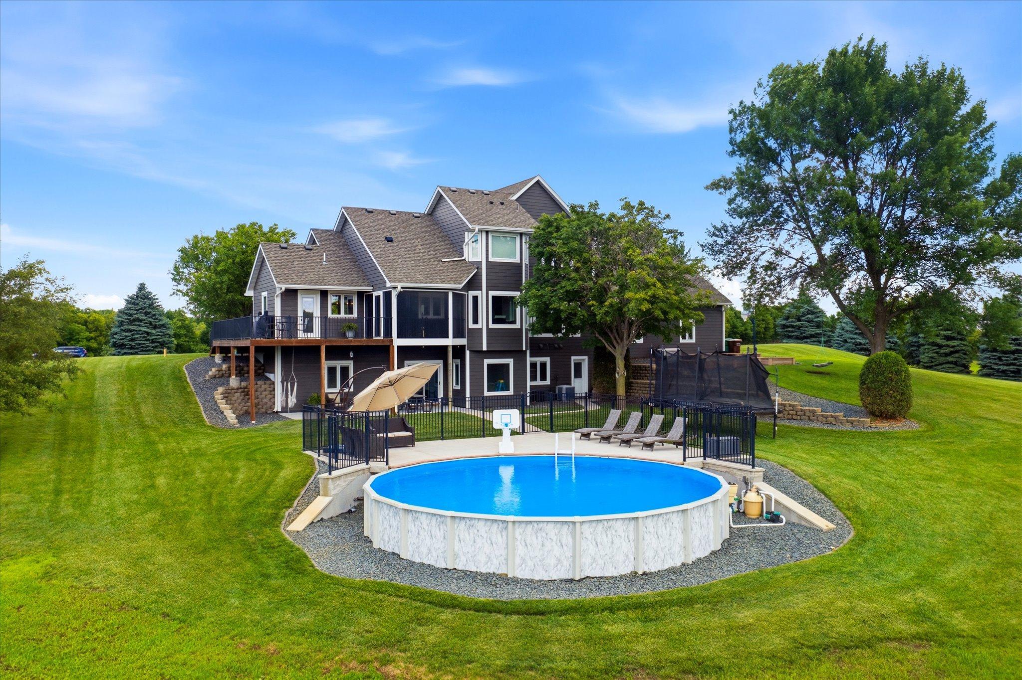 Enjoy the beautiful backyard featuring a swimming pool, perfect for relaxing and entertaining!