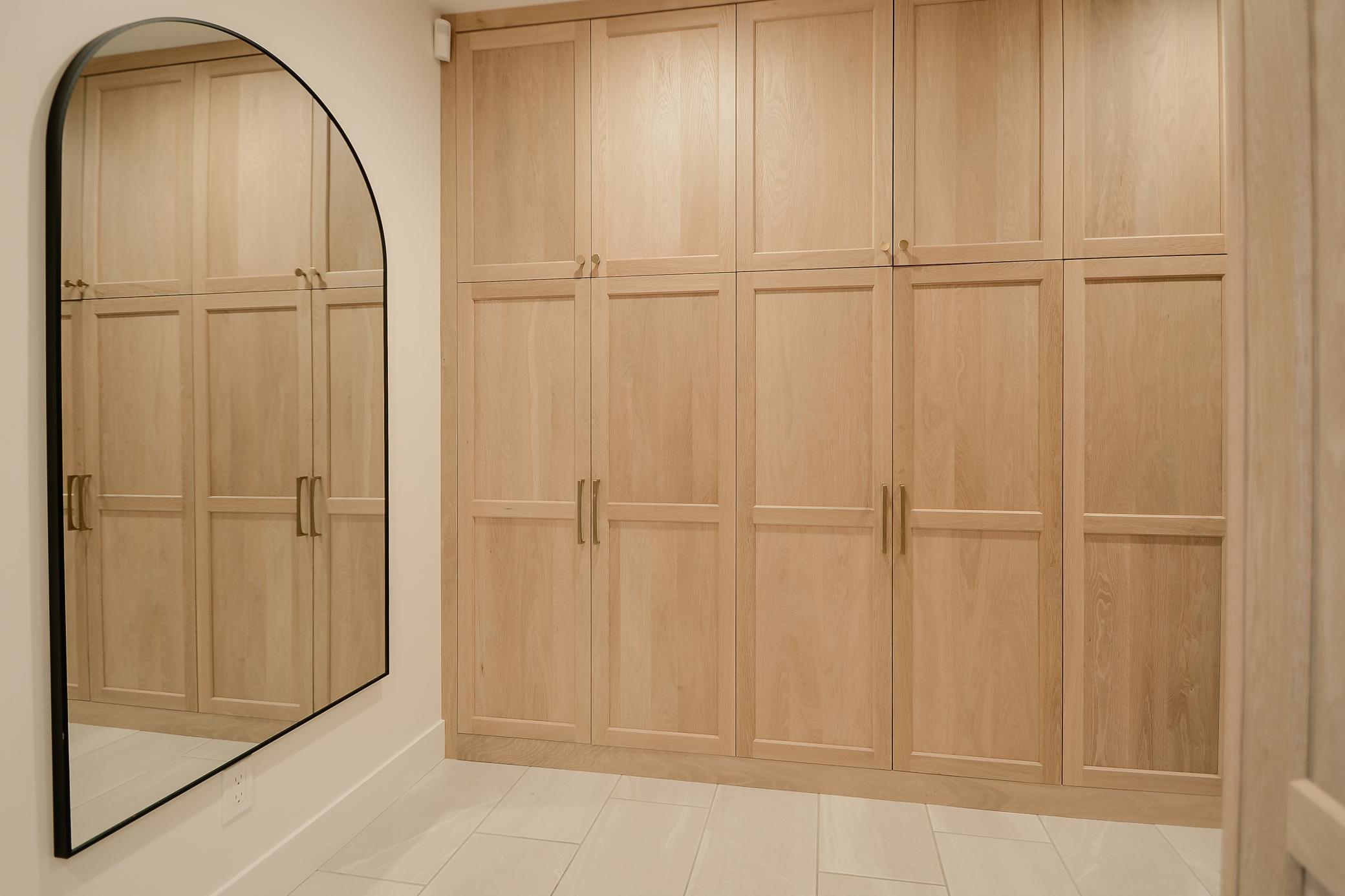 Mudroom features in-floor heating and additional storage