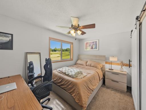 Lower level bedroom features a window facing the back yard!