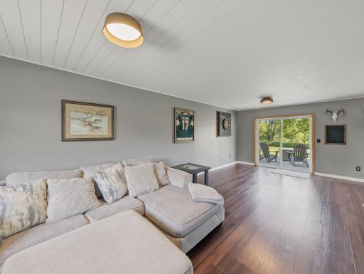 Sliding glass doors to the patio in the back just beside the deck.