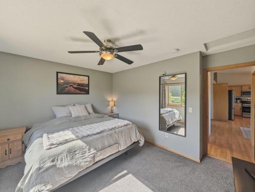 Bedroom 1 on upper level is spacious and bright!