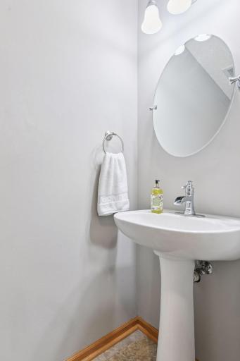 Convenient ML 1/2 bathroom located off kitchen.