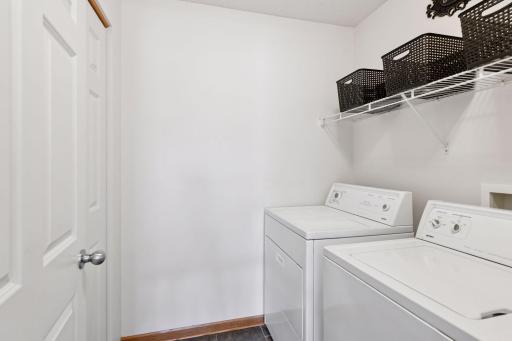 Convenient upper level laundry room on 2nd floor near bedrooms.