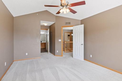 Walk-through to full, upper level bathroom. Modern, white 6 panel doors throughout. Neutral carpeting!