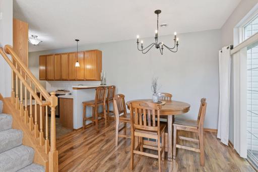 Informal dining walks out to private patio. Stylish modern fixtures.