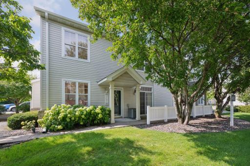 Welcome to Harvest Hills! End-unit location with private patio with treed views.