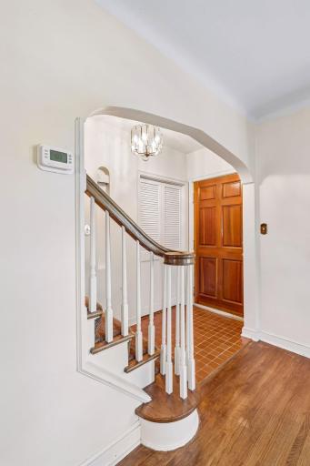 Inviting front entry / foyer with central staircase.