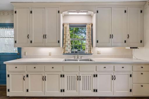 Kitchen has plenty of counter and cabinet space.