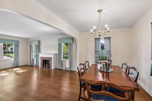 Notice the charming archway between the living and dining areas.
