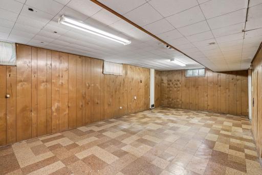 Lower level can be used as an amusement room, additional family room, office or storage.