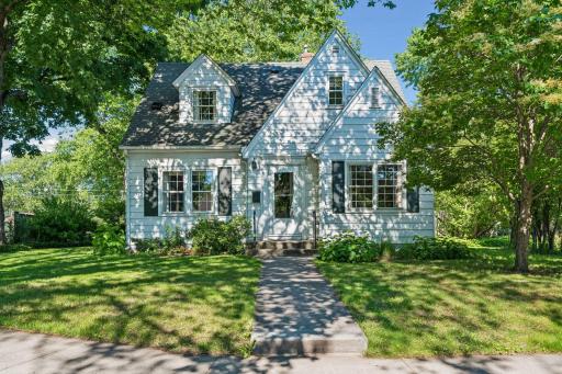Welcome to 3200 Alabama Ave S in St. Louis Park. Beautiful front yard with mature trees.