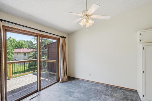 The dining area provides easy access to the deck, extending living space outdoors.