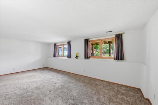 A spacious family room provides additional flexibility for entertainment, hobbies, or everyday use.