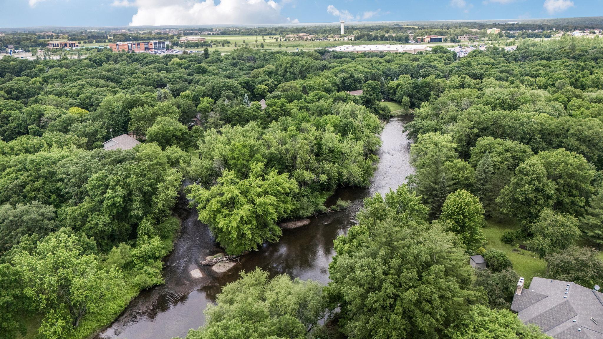 Nestled among mature trees this property offers a rare combination of privacy, natural beauty, and everyday comfort.