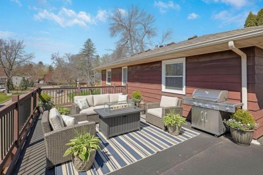 Virtually staged deck with views to quiet neighborhood.