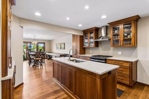 A very open flow throughout your main level. Here features the kitchen center island that is great for cooking preparation and hosting.