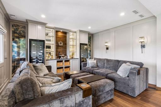 Great seating area that features the two large wine cabinets with wine coolers. Perfect areas to display your glassware. Everything was remodeled so beautifully during the renovations.