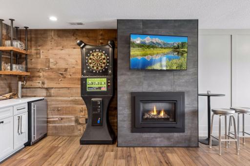 New fireplace that was included in the extensive remodel. Super cozy spot in your lower level. Great for entertaining.