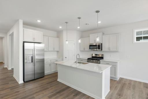 Bright Kitchen with corner pantry, oversized island