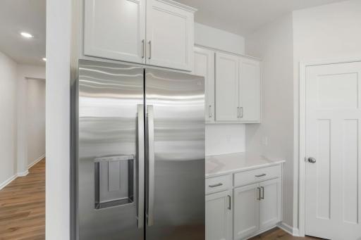 Extra counter space, included refrigerator with ice maker