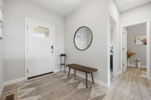 Easy living with your primary suite on the main floor, along with an additional flex/office space located near the powder room.