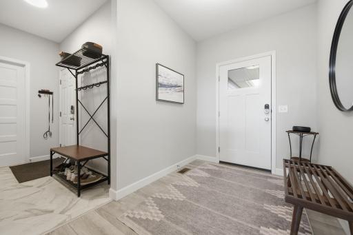 Neutral and clean as a whistle! Your front entry is spacious and inviting.