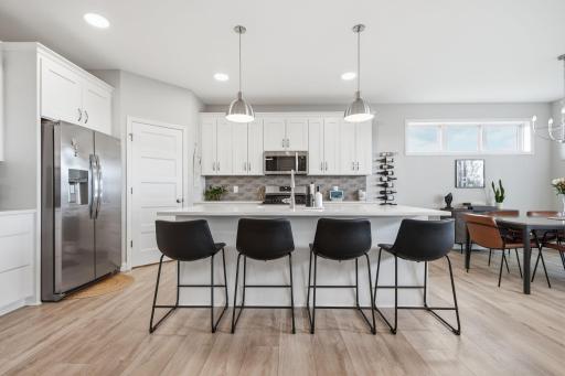 Multiple countertop spaces for day to day living as well as entertaining.