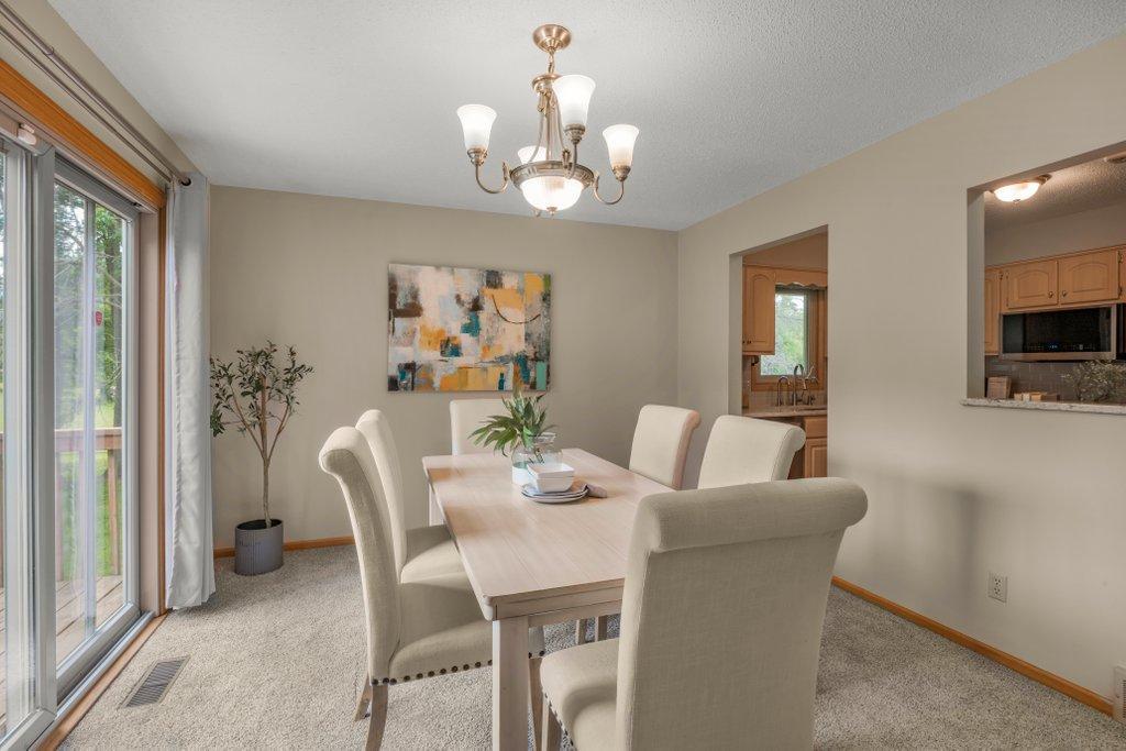 Dining Room with patio doors leading to deck, Upper Level