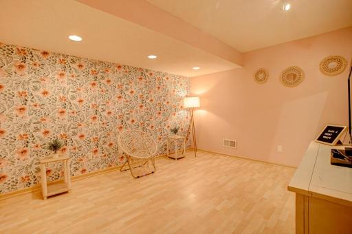 Lower level flex space for a family room, workout area, home office or playroom
