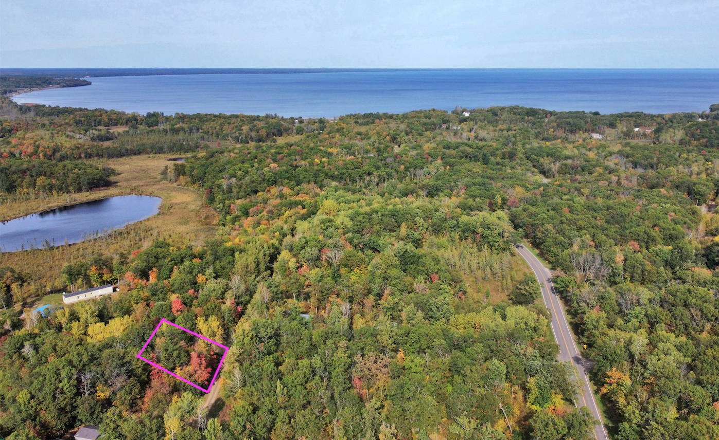 Lot Location in pink .46 wooded acres