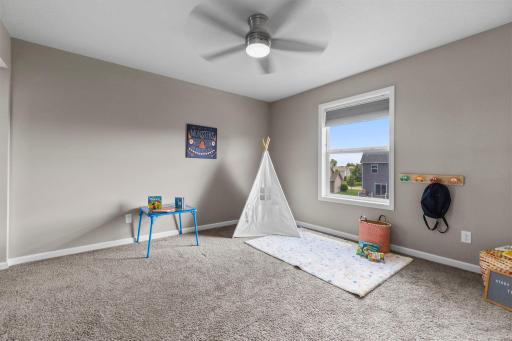 Upper level bedroom currently set up as a Playroom