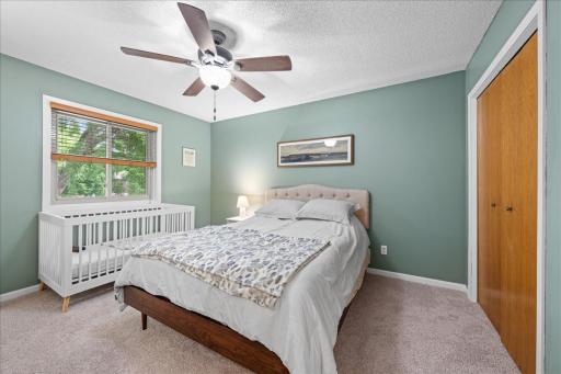 Primary bedroom with ceiling fan for those cool but not to hot evenings.