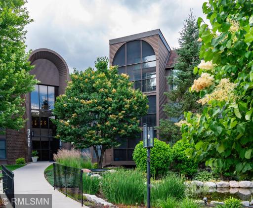Front entrance to Old Shakopee Park South Condominiums. The top level screened porch in the center of this photo is unit 330.