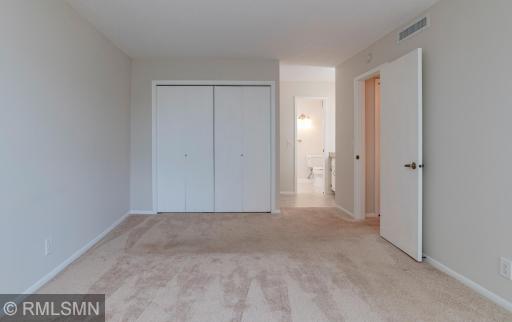 The primary bedroom is quite generous in size.