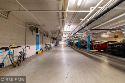 Amazing undergound heated garage has a car wash.