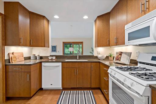 The kitchen is fabulous and the open window makes for an easy transition from cooking meals to entertaining guests.