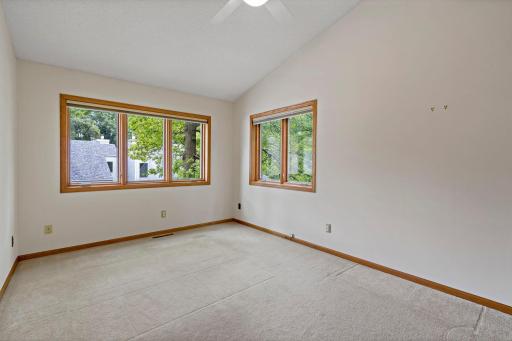 The second bedroom has great light and huge walk-in closet. The sellers used this as their primary bedroom