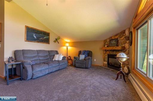 Cozy family room with Fireplace, new carpeting