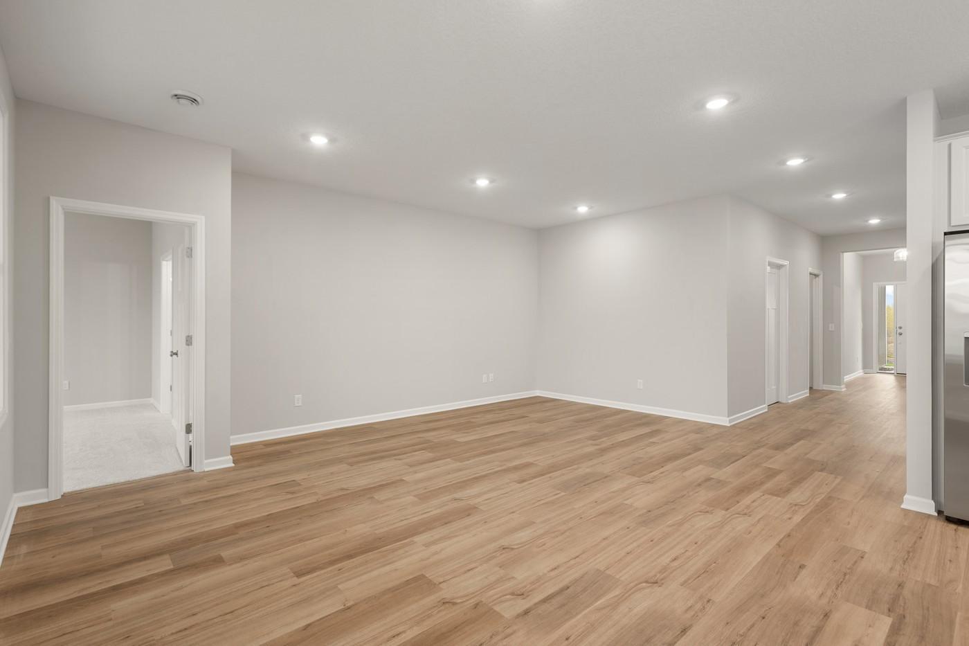 Spacious Family room adjacent to kitchen - Image of the Actual Home