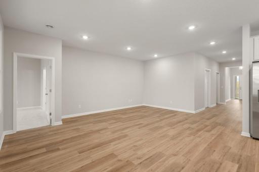 Spacious Family room adjacent to kitchen - Image of the Actual Home