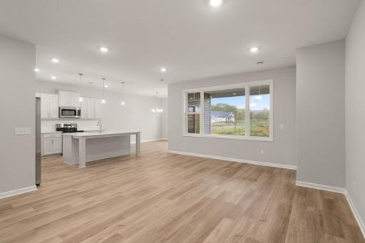 Family room adjacent to kitchen area - Image of the Actual Home